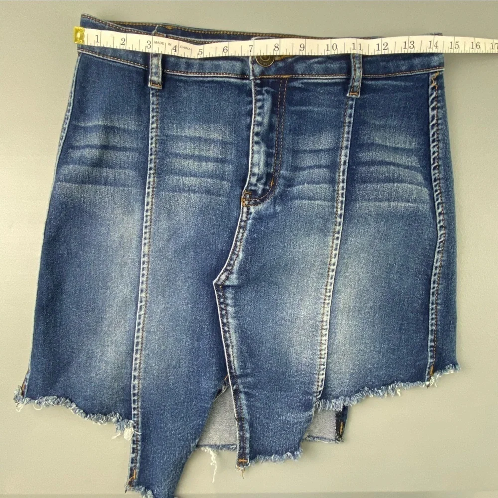 Machine torn up look blue jean mini skirt with stretch size large